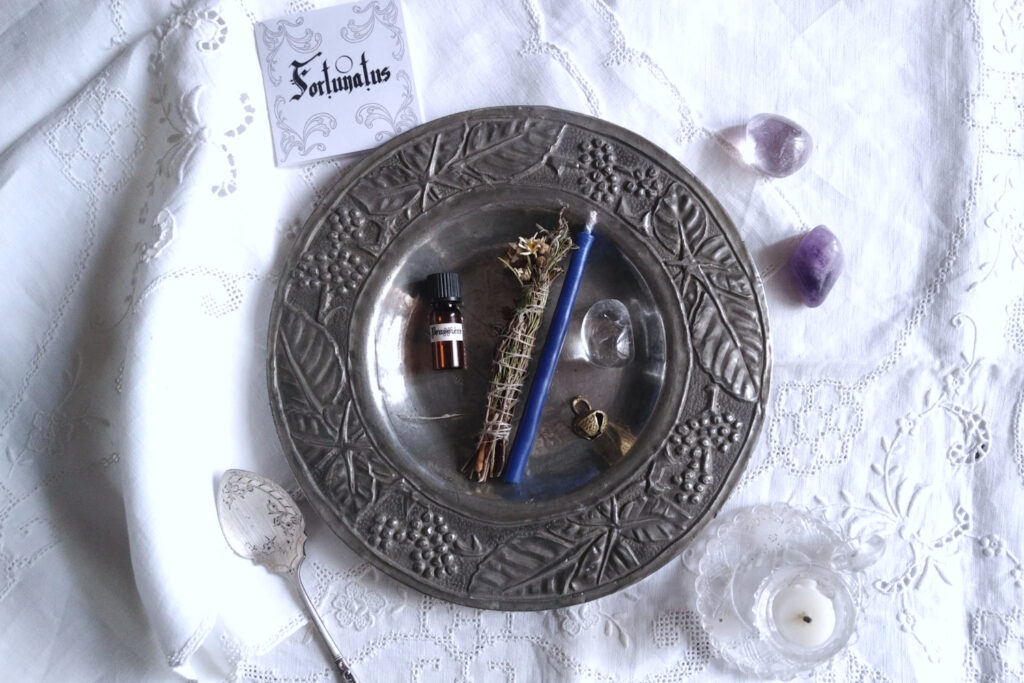 Mini candle, mini vials, amethyst and crystal quartz, on antique tin plate, with antique spoon
