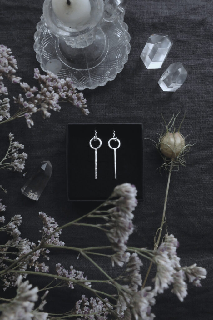 Dangle earrings with Sól, Medieval Rune of Healing & Magick with a candle, crystals & Limonium